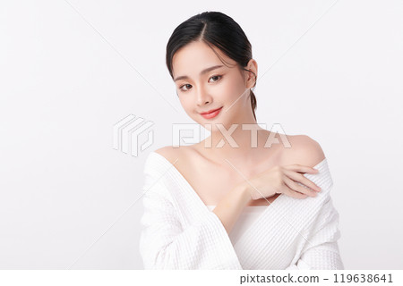 Beautiful young asian woman with clean fresh skin on white background, Face care, Facial treatment, Cosmetology, beauty and spa, Asian women portrait. Beautiful young asian woman with clean fresh skin on white background, Face care, Facial treatment, Cosmetology, beauty and spa, Asian women portrait. 119638641