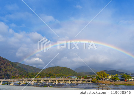 A large rainbow spans the Togetsukyo Bridge in Arashiyama A large rainbow spans the Togetsukyo Bridge in Arashiyama 119638846