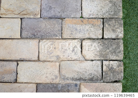 Bricks and artificial grass Bricks and artificial grass 119639465