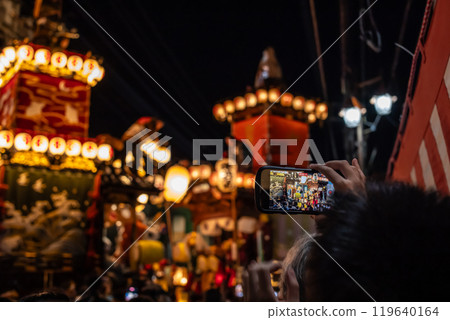 Night festival and spectators taking photos Kawagoe Festival floats 119640164