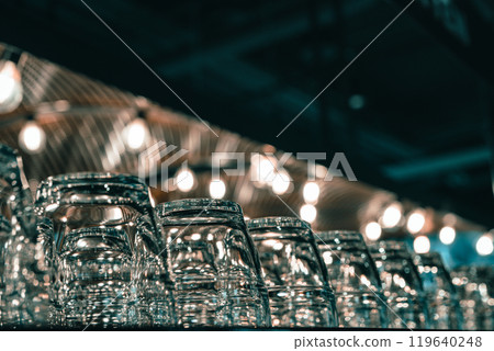 Upside-down glass cups and warm lighting Upside-down glass cups and warm lighting 119640248