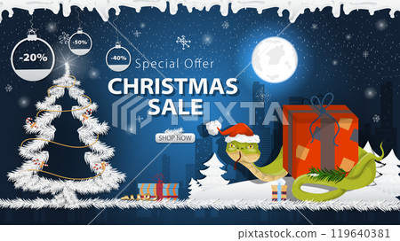 Banner special offer Christmas sale A snake in a Santa hat Wraps around a gift box with a festive fir tree in the snow Banner special offer Christmas sale A snake in a Santa hat Wraps around a gift box with a festive fir tree in the snow 119640381