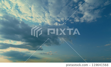 Cloudy Sky At Sunset. Beautiful Altocumulus And Stratocumulus Cloudy Background. 119641568