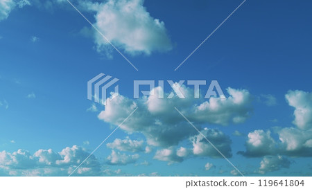 Tiny Fluffy Clouds In Sunny Day. Puffy Fluffy White Clouds. Cumulus Cloud Cloudscape. Atmosphere. 119641804