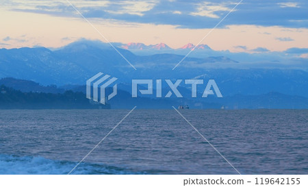 Ships In The City Bay. Calm Black Sea. Mountain Slopes With Hotels And Houses. Tsikhisdziri, Adjara, Georgia. Ships In The City Bay. Calm Black Sea. Mountain Slopes With Hotels And Houses. Tsikhisdziri, Adjara, Georgia. 119642155