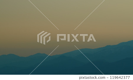 Beautiful Golden Sunrise. Silhouette Of The Mountain Hills Against Sunrise Sky. Beautiful Golden Sunrise. Silhouette Of The Mountain Hills Against Sunrise Sky. 119642377