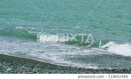 White Foam Waves In Bright Blue Green Sea. Crystal Blue Waves With White Foam. Slow motion. White Foam Waves In Bright Blue Green Sea. Crystal Blue Waves With White Foam. Slow motion. 119642466