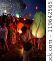 people are walking in the night club 119642565