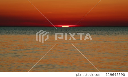 Beautiful Sunset Above Sea. Vibrant Color Panoramic Sun Rise And Sun Set Clear Sky. Nobody. Slow motion. Beautiful Sunset Above Sea. Vibrant Color Panoramic Sun Rise And Sun Set Clear Sky. Nobody. Slow motion. 119642590