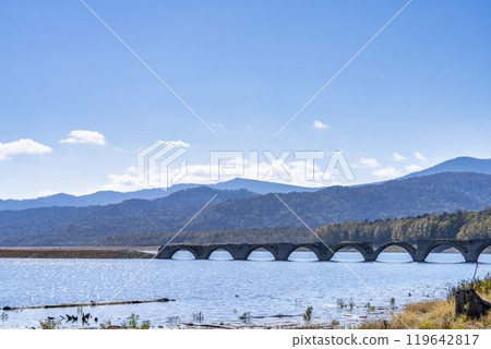 Taushubetsu River Bridge on the former Shihoro Line of the Japanese National Railways on a clear autumn day in Kamishihoro, Hokkaido Taushubetsu River Bridge on the former Shihoro Line of the Japanese National Railways on a clear autumn day in Kamishihoro, Hokkaido 119642817