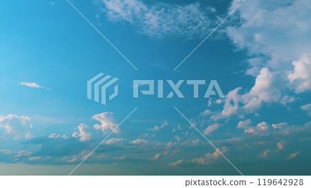 Cirrocumulus cloud in evening. Beautiful and relaxing clouds with a dark blue afternoon sky. Cirrocumulus cloud in evening. Beautiful and relaxing clouds with a dark blue afternoon sky. 119642928