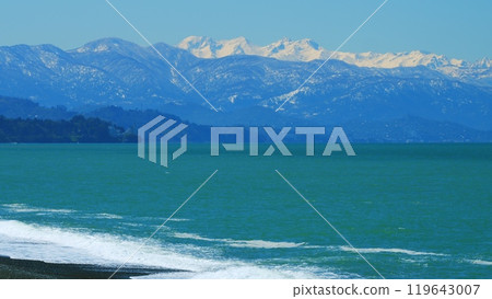 Beautiful Views Of The Sea And The Snow-Capped Mountains. Snow Capped Mountain And Sky. Still. Beautiful Views Of The Sea And The Snow-Capped Mountains. Snow Capped Mountain And Sky. Still. 119643007