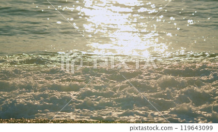 Reflection Of Sunlight Over Lake Surface. Too Many Shiny Reflections Of The Sun In The Water. Slow motion. Reflection Of Sunlight Over Lake Surface. Too Many Shiny Reflections Of The Sun In The Water. Slow motion. 119643099