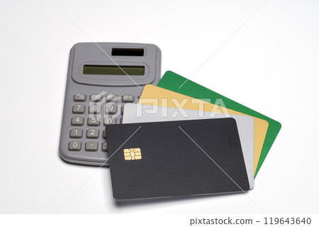 Plain credit cards and calculators in various colors 119643640