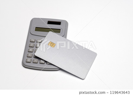 Plain silver credit card and calculator 119643643