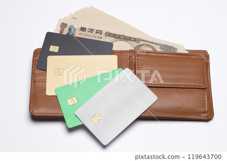 A wallet, 10,000 yen bills, and credit cards of various colors A wallet, 10,000 yen bills, and credit cards of various colors 119643700