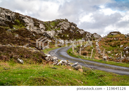 The coastal single track road between Meenacross and Crohy Head south of Dungloe, County Donegal - Ireland 119645126