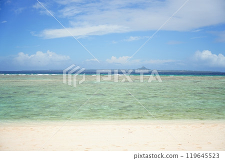 Sesoko Island, Okinawa Prefecture, Sesoko Beach, white sand, blue sky and emerald green sea 119645523