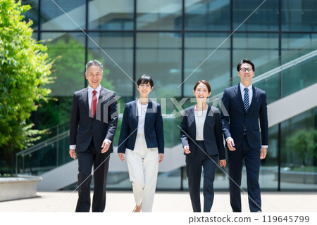 Business person walking outdoors 119645799