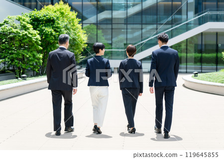 Business person walking back view 119645855