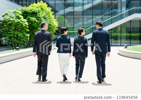 Business person walking back view Business person walking back view 119645856