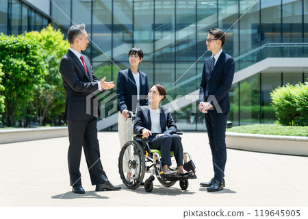 Business wheelchair team Business wheelchair team 119645905