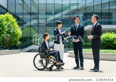 Business wheelchair team Business wheelchair team 119645914