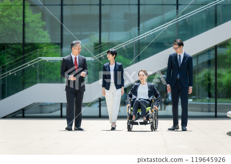 Business wheelchair team walking Business wheelchair team walking 119645926