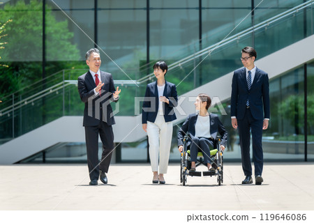 Business wheelchair team walking Business wheelchair team walking 119646086