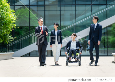 Business wheelchair team walking 119646088