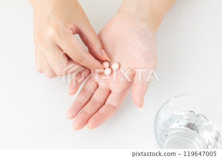 Woman taking medicine 03 Woman taking medicine 03 119647005