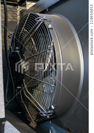 Industrial cooling fan rotating and providing ventilation Industrial cooling fan rotating and providing ventilation 119650853