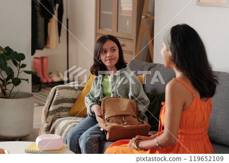Mother and Child Preparing for School Morning 119652109