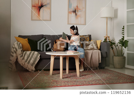Child Engaging in Relaxed Home Environment Child Engaging in Relaxed Home Environment 119652136