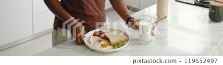 Preparing Healthy Breakfast in Modern Kitchen Setting 119652497
