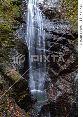 A healing space created by a natural waterfall and clear stream 119652738