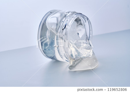 Texture of the gel in the jar. Hair gel or hyaluronic gel for the face. Texture of the gel in the jar. Hair gel or hyaluronic gel for the face. 119652806