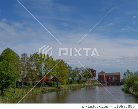 Greetsiel at the north sea coast in germany Greetsiel at the north sea coast in germany 119653896