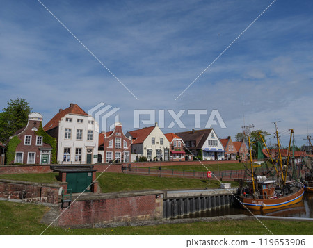 Greetsiel at the north sea coast in germany Greetsiel at the north sea coast in germany 119653906