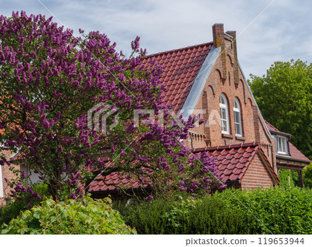 Greetsiel at the north sea coast in germany Greetsiel at the north sea coast in germany 119653944
