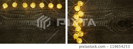 christmas garland lights on old wooden background with copy space for your text. Top view 119654253