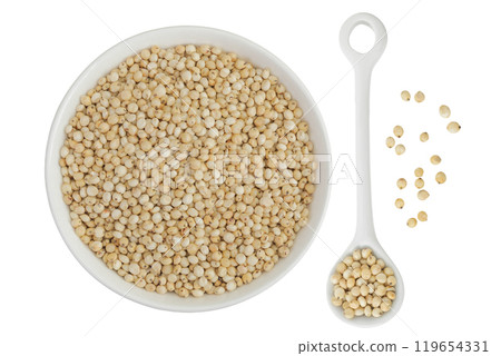 Sorghum seeds in ceramic bowl isolated on white background. Top view. Flat lay. 119654331