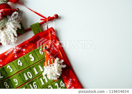 Santa Claus advent calendar on white background Christmas image Copy space 119654654