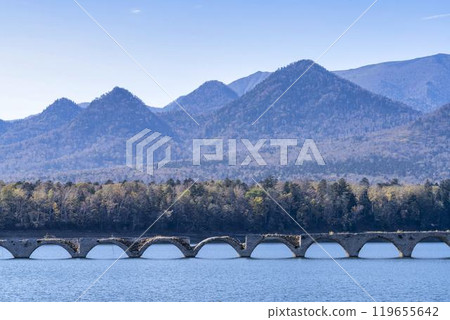 Taushubetsu River Bridge on the former Shihoro Line of the Japanese National Railways on a clear autumn day in Kamishihoro, Hokkaido 119655642