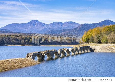 Taushubetsu River Bridge on the former Shihoro Line of the Japanese National Railways on a clear autumn day in Kamishihoro, Hokkaido Taushubetsu River Bridge on the former Shihoro Line of the Japanese National Railways on a clear autumn day in Kamishihoro, Hokkaido 119655675