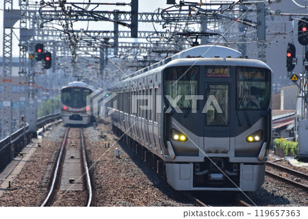 The Kansai Airport-Kishuji Rapid 225 series 5000 series train passing Noda Station The Kansai Airport-Kishuji Rapid 225 series 5000 series train passing Noda Station 119657363