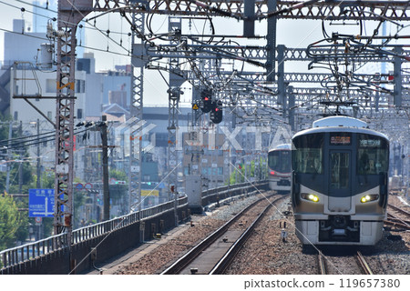 Kansai Airport-Kishuji Rapid 225 series 5100 train passing Noda Station 119657380