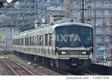 Yamatoji Rapid 221 series train passing through Taisho Station Yamatoji Rapid 221 series train passing through Taisho Station 119657569