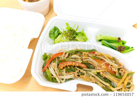 Delicious Chinese bento with sautéed pork 119658857