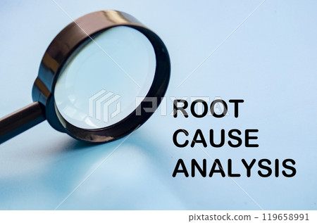 Root Cause Analysis text on blue cover with magnifying glass background. Business solution concept Root Cause Analysis text on blue cover with magnifying glass background. Business solution concept 119658991